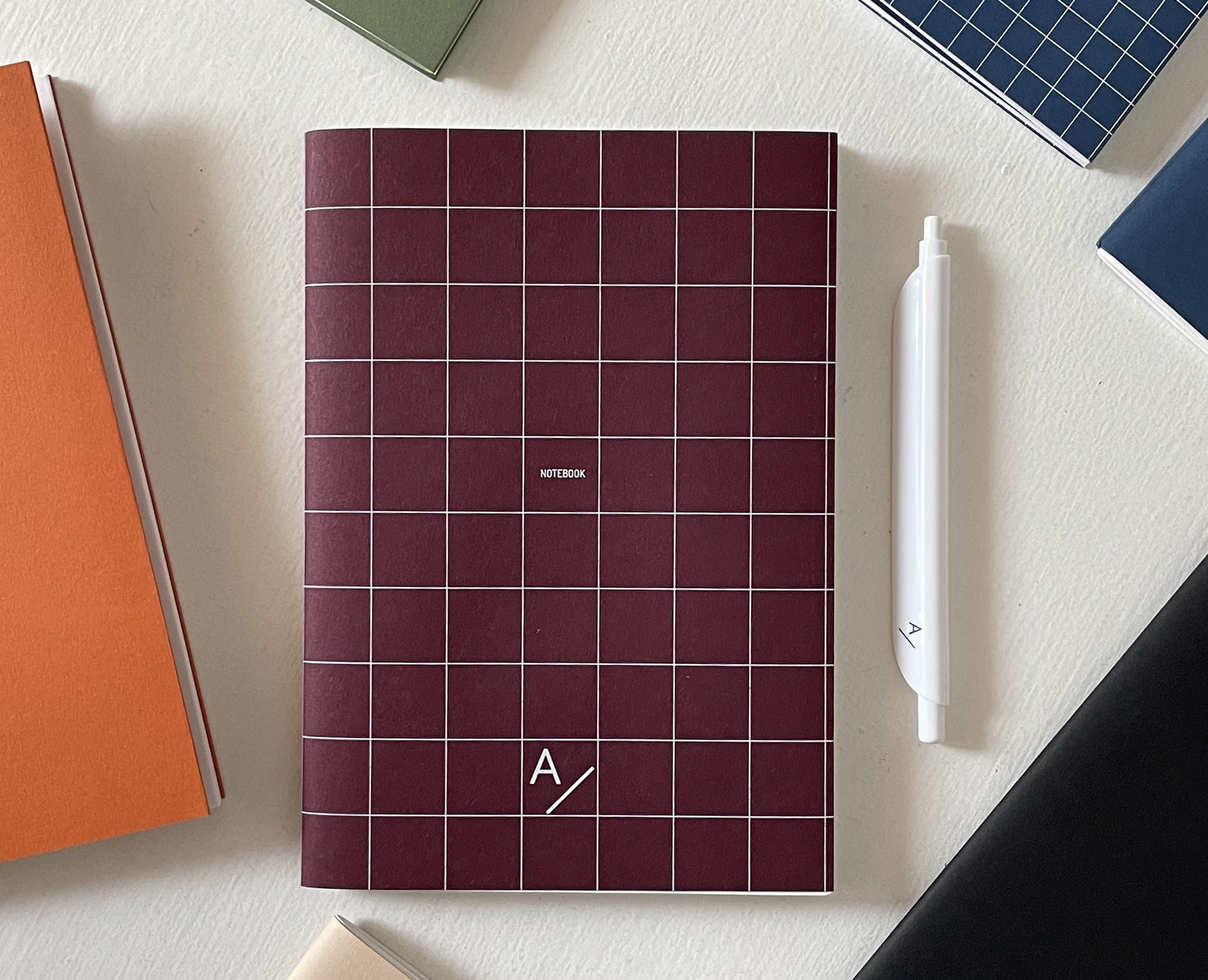 notebooks with the logo of Anomali on them
